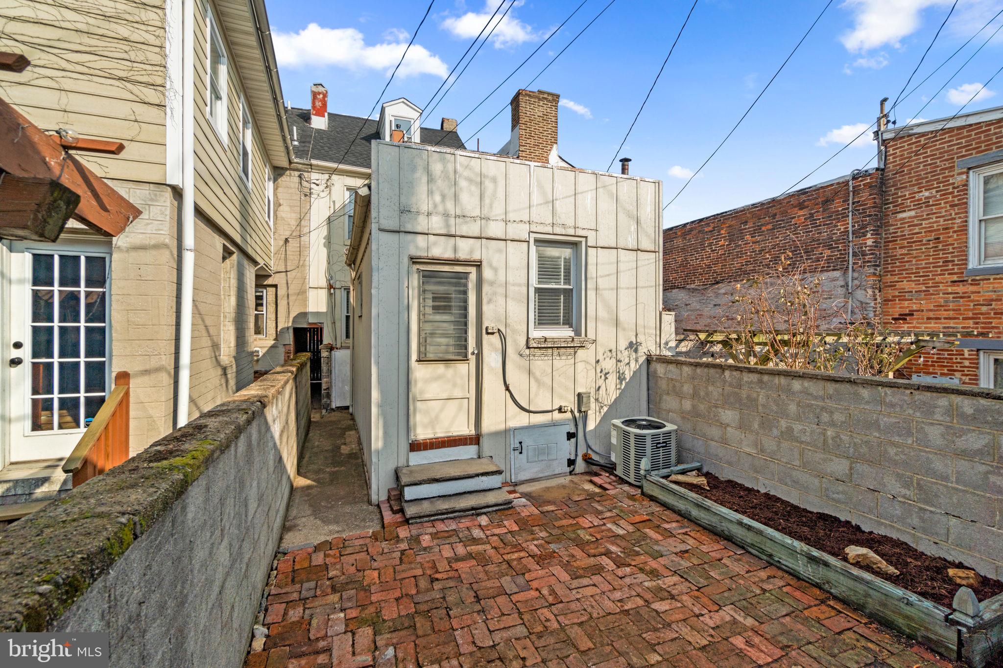 1827 Bank Street Baltimore, MD 21231 - Photo 28 of 31 Charming urban retreat with brick patio.
