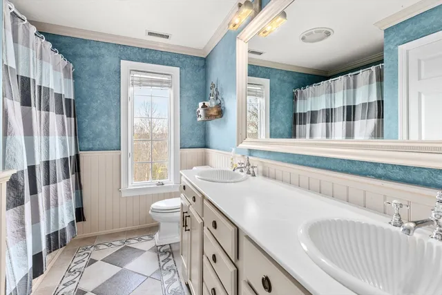 a bathroom with a sink and a toilet