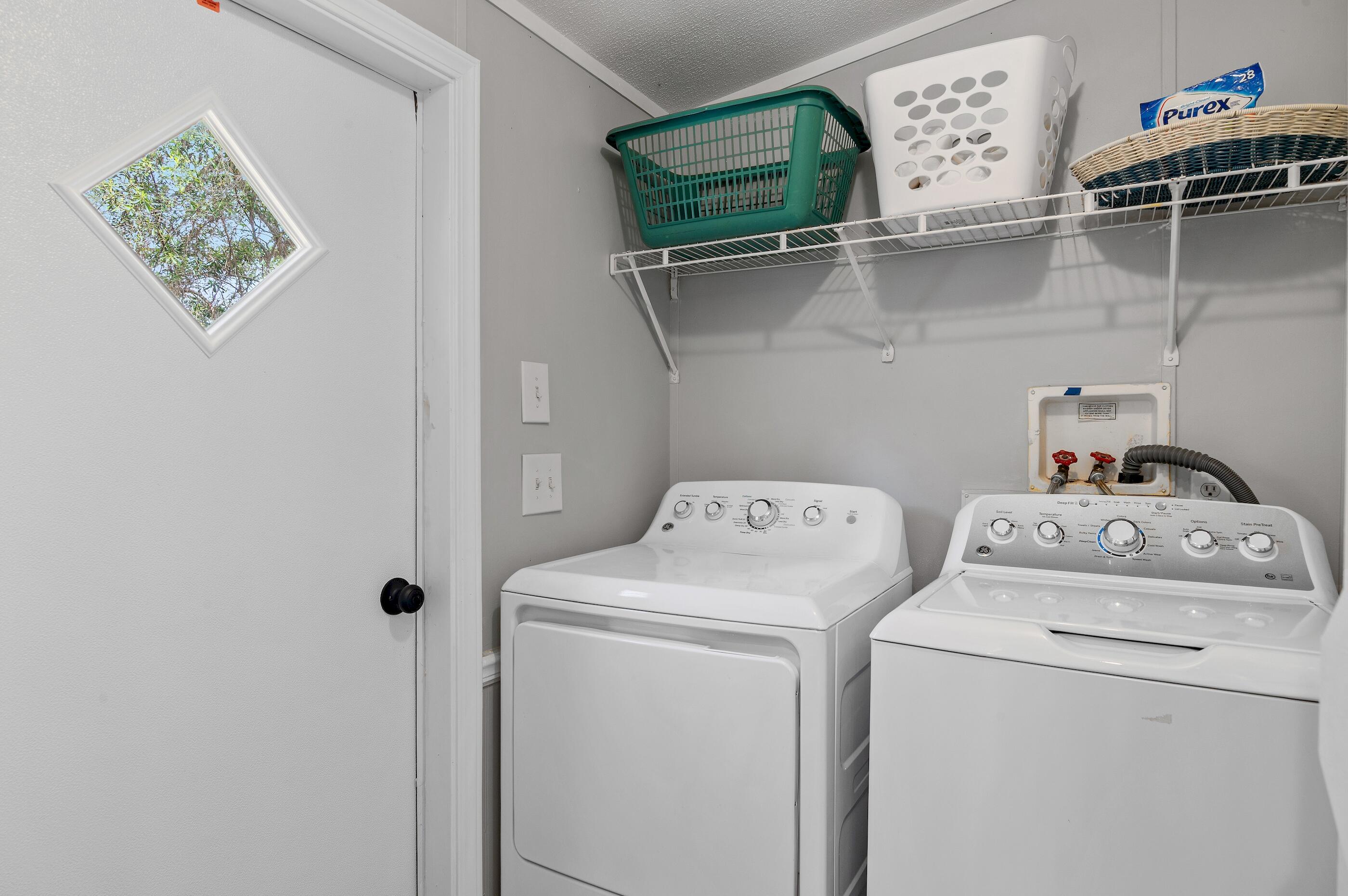 301 Edgewood Terrace Santa Rosa Beach, FL 32459 - Photo 26 of 34 a utility room with dryer and washer