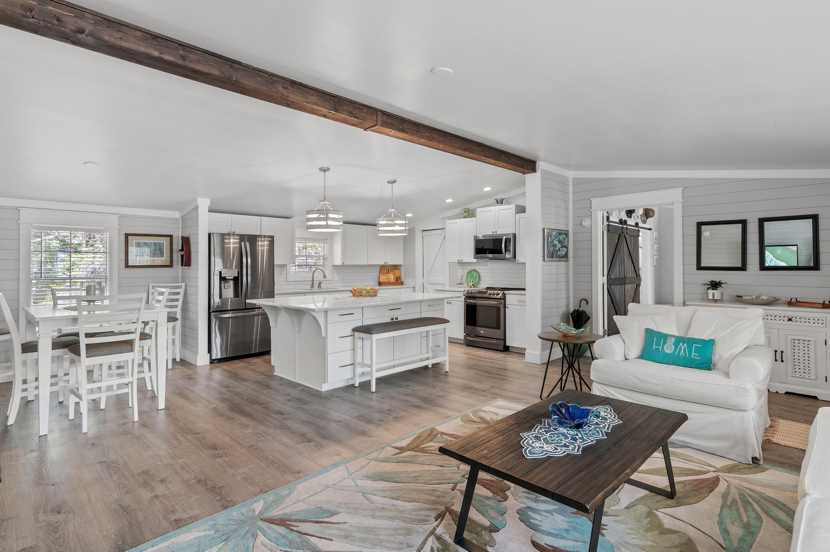 301 Edgewood Terrace Santa Rosa Beach, FL 32459 - Photo 7 of 34 a living room with furniture and kitchen view