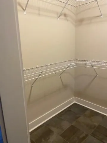 a view of a room with racks on the wall