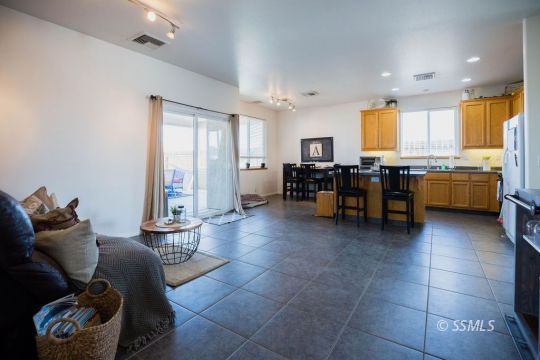 812 South Nevada Street Ridgecrest, CA 93555 - Photo 14 of 34 a living room with furniture and window