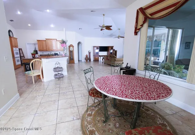 a view of a dining room with furniture