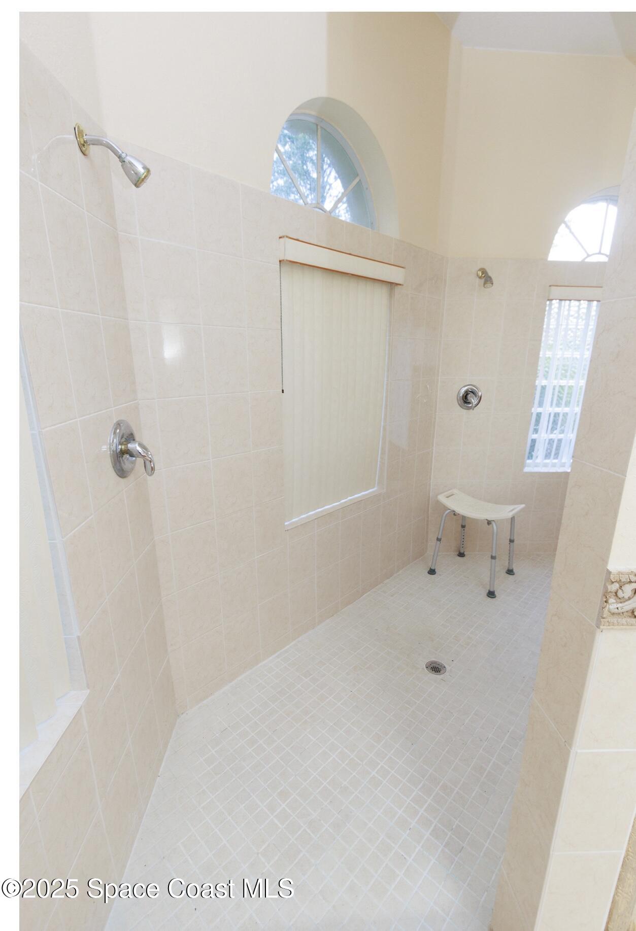 1857 Timbers W Boulevard Rockledge, FL 32955 - Photo 34 of 44 a bathroom with a bathtub and shower