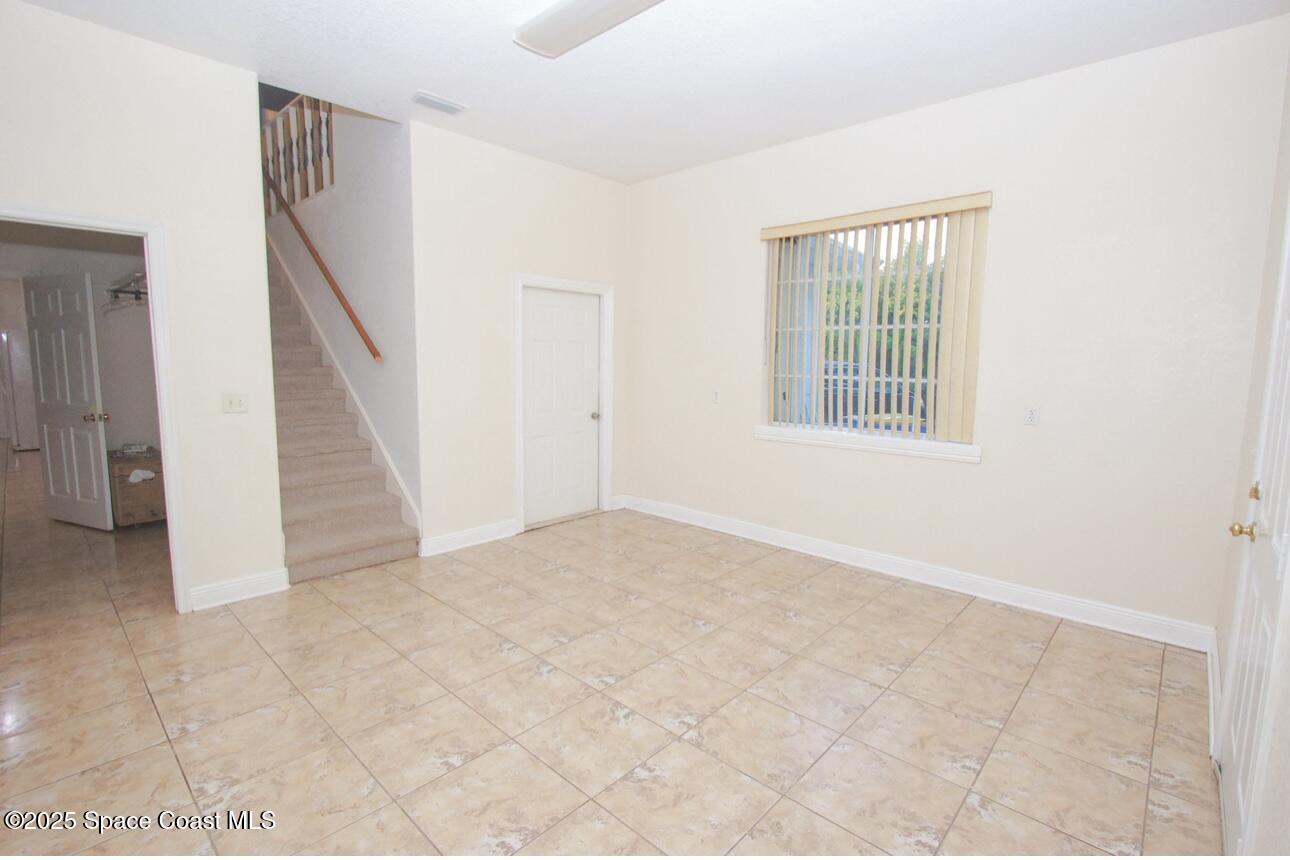 1857 Timbers W Boulevard Rockledge, FL 32955 - Photo 36 of 44 a view of an empty room with windows