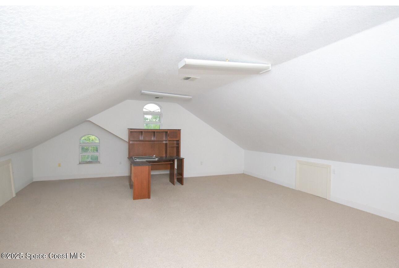 1857 Timbers W Boulevard Rockledge, FL 32955 - Photo 38 of 44 a view of empty room with wooden floor