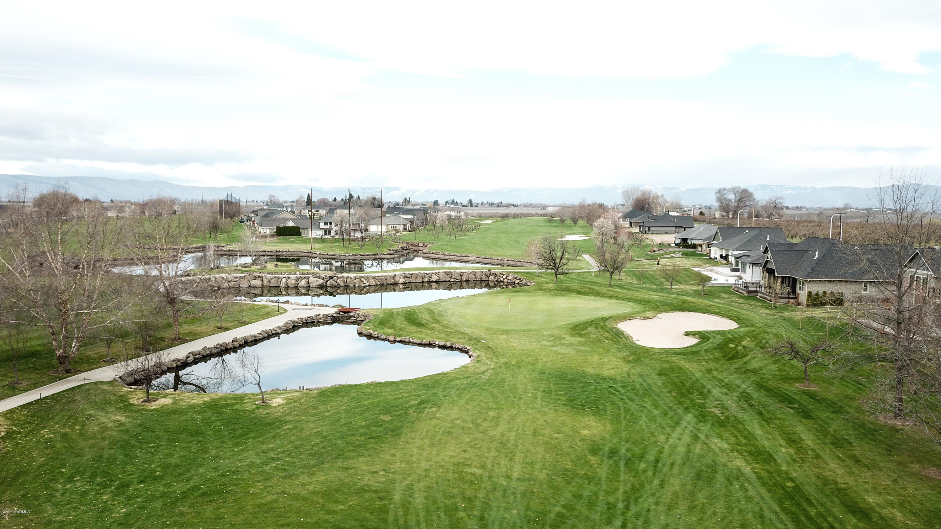9202 Coolidge Road Yakima, WA 98903 - Photo 42 of 45 a view of a lake with a yard