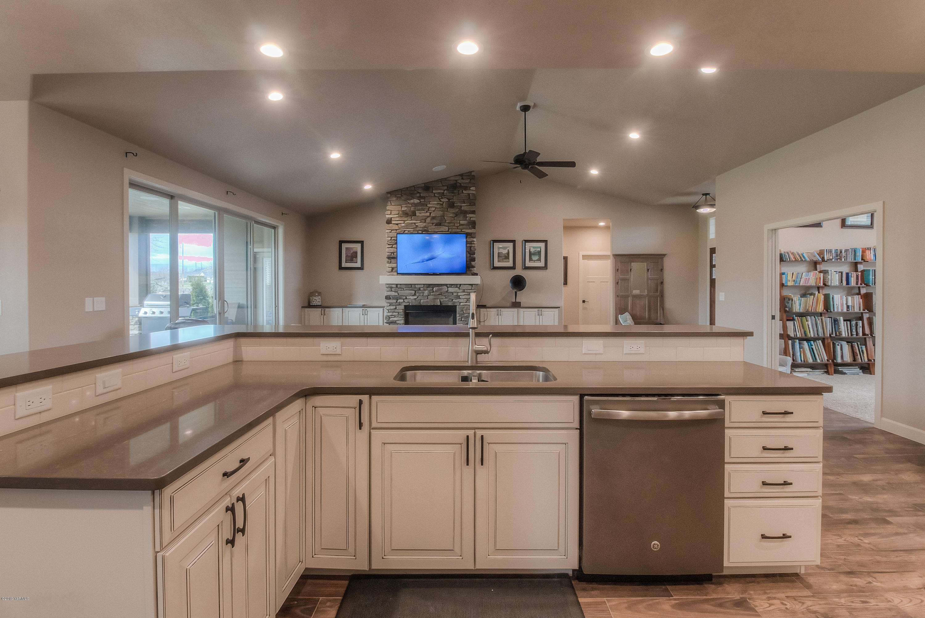 9202 Coolidge Road Yakima, WA 98903 - Photo 8 of 45 a kitchen with white cabinets and sink