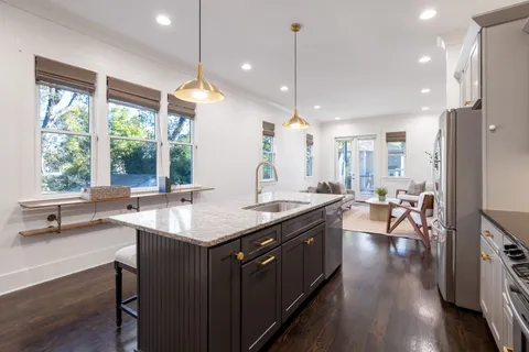 a balcony with furniture and a window