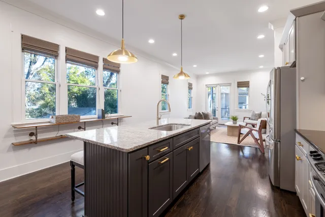 a balcony with furniture and a window