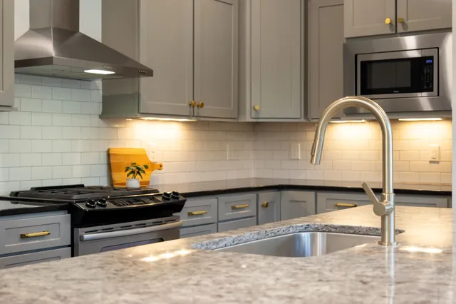 a balcony with view of trees and wooden floor