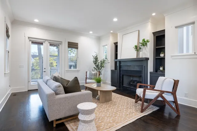 a spacious bathroom with a double vanity sink a mirror and shower