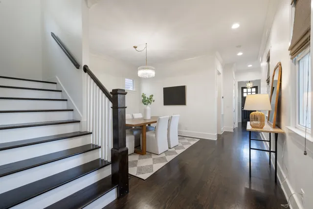 a large kitchen with kitchen island a large window