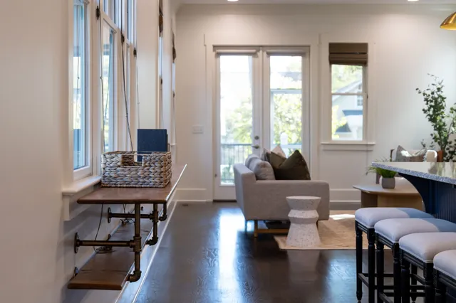 a stove top oven sitting inside of a kitchen
