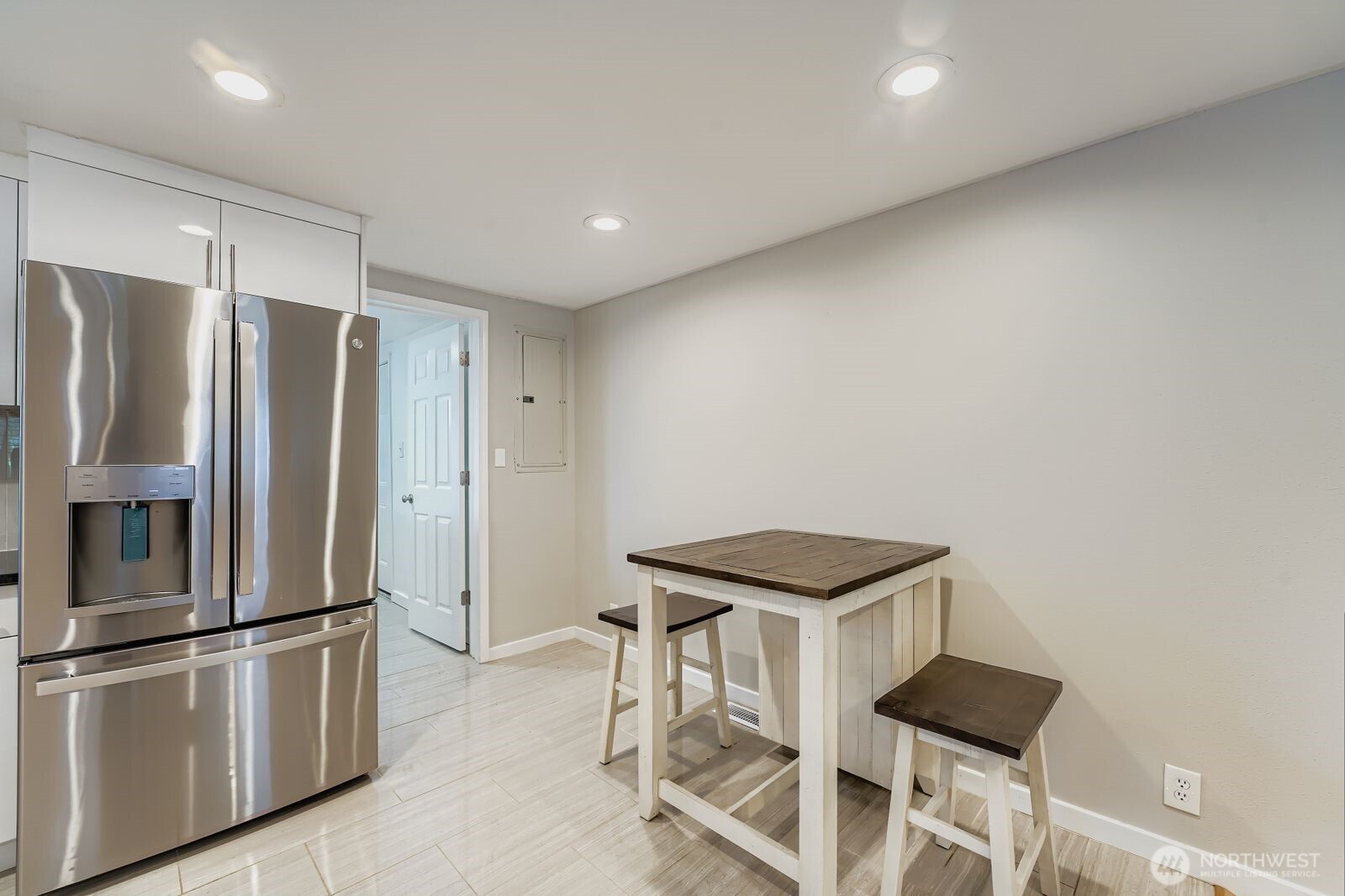 3533 Southeast 5th Street Renton, WA 98058 - Photo 14 of 25 a kitchen with stainless steel appliances granite countertop a refrigerator and a stove top oven