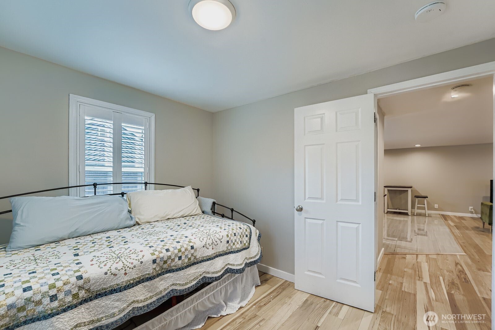 3533 Southeast 5th Street Renton, WA 98058 - Photo 20 of 25 a bedroom with a bed and a window