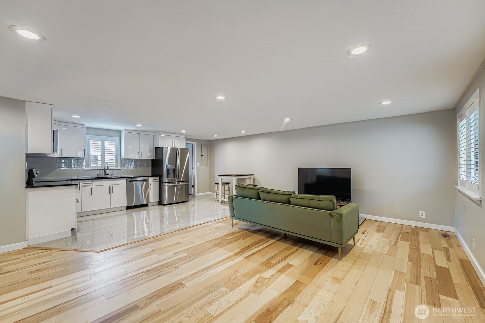 3533 Southeast 5th Street Renton, WA 98058 - Photo 7 of 25 a living room with furniture and a flat screen tv