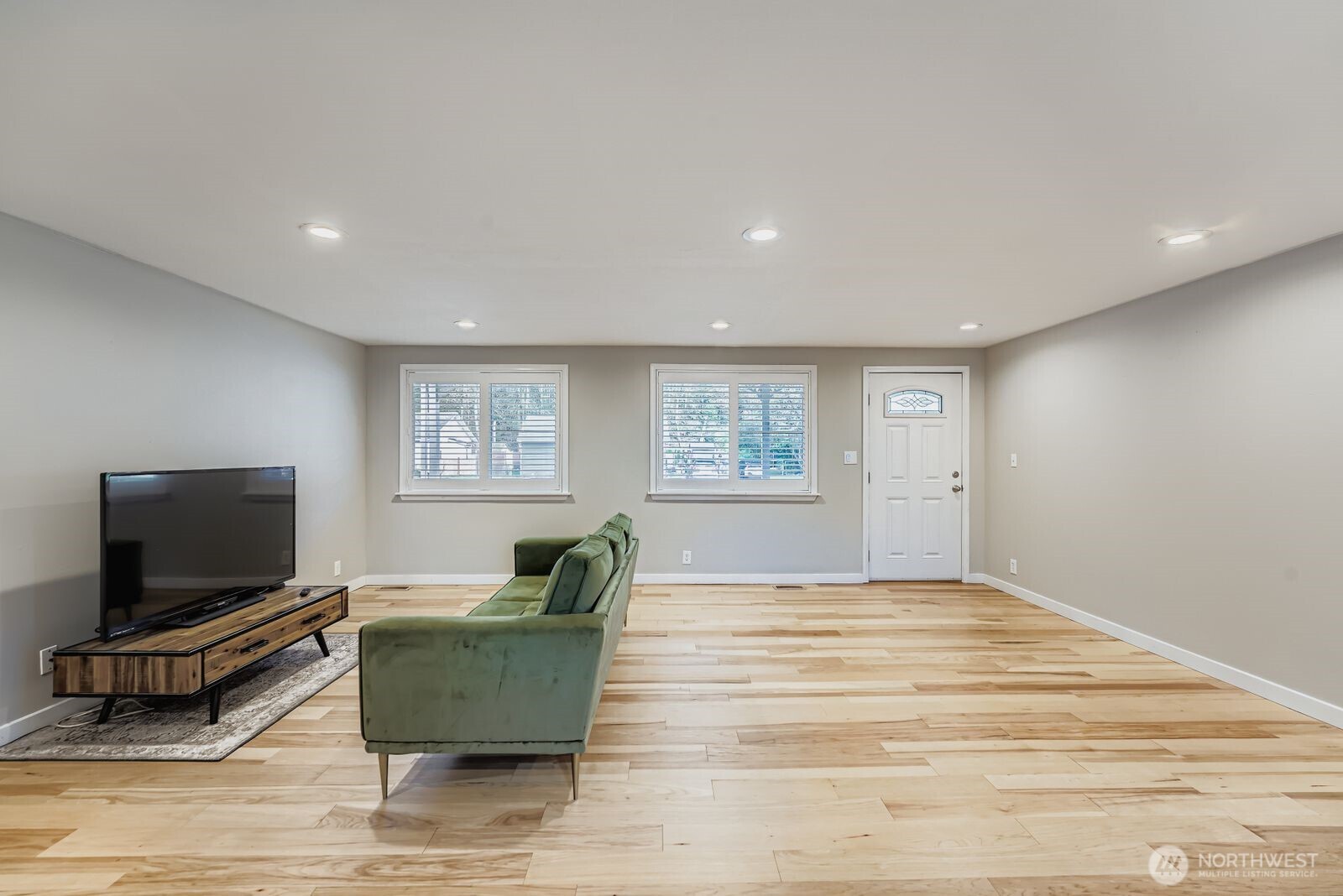 3533 Southeast 5th Street Renton, WA 98058 - Photo 9 of 25 a living room with furniture and a flat screen tv
