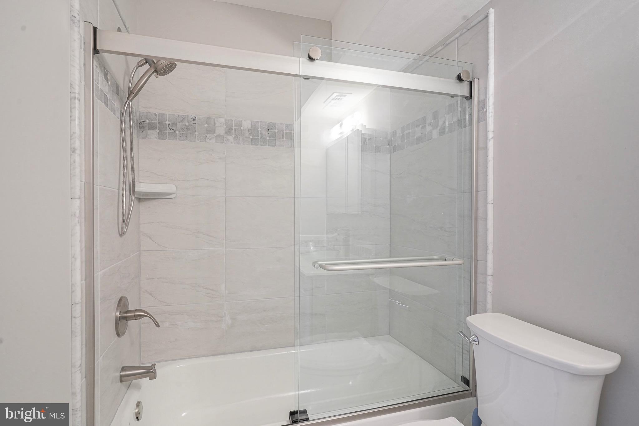 9 Samuel Adams Sewell, NJ 08080 - Photo 13 of 19 a bathroom with a shower and a toilet