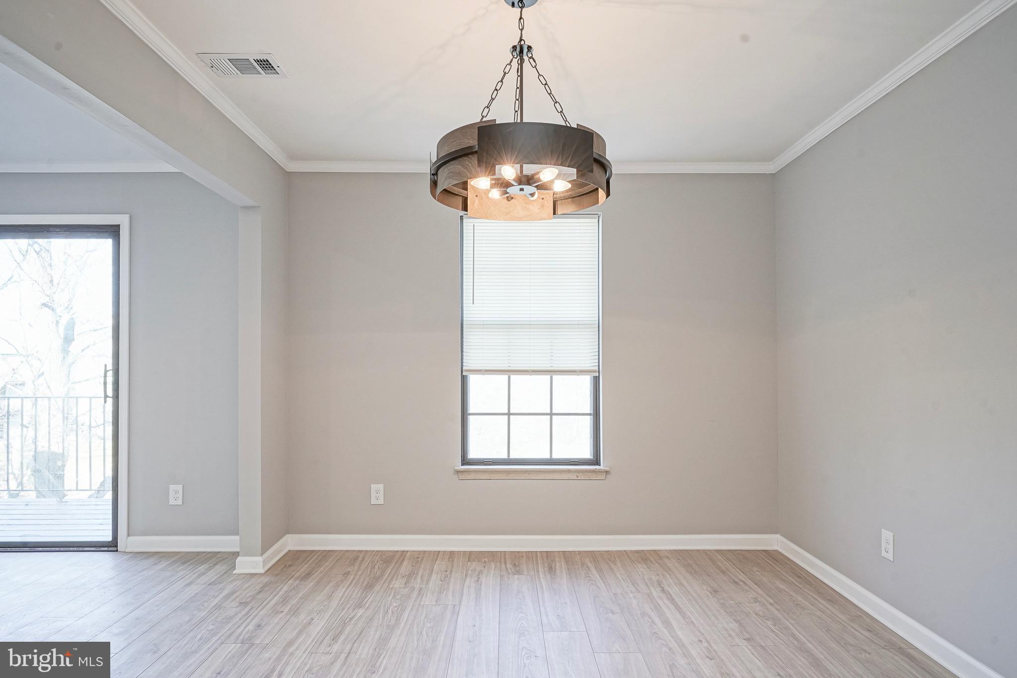 9 Samuel Adams Sewell, NJ 08080 - Photo 5 of 19 wooden floor in an empty room with a window