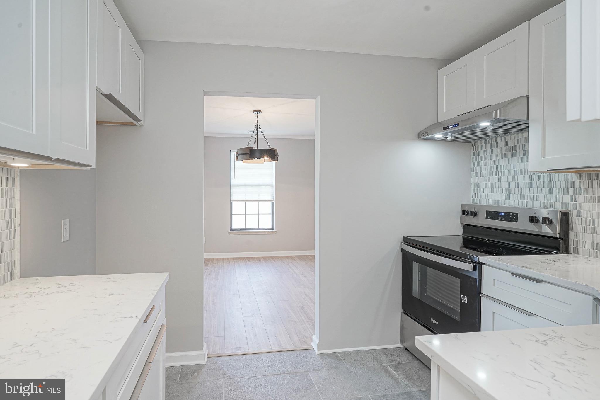 9 Samuel Adams Sewell, NJ 08080 - Photo 8 of 19 a kitchen that has a sink and a stove