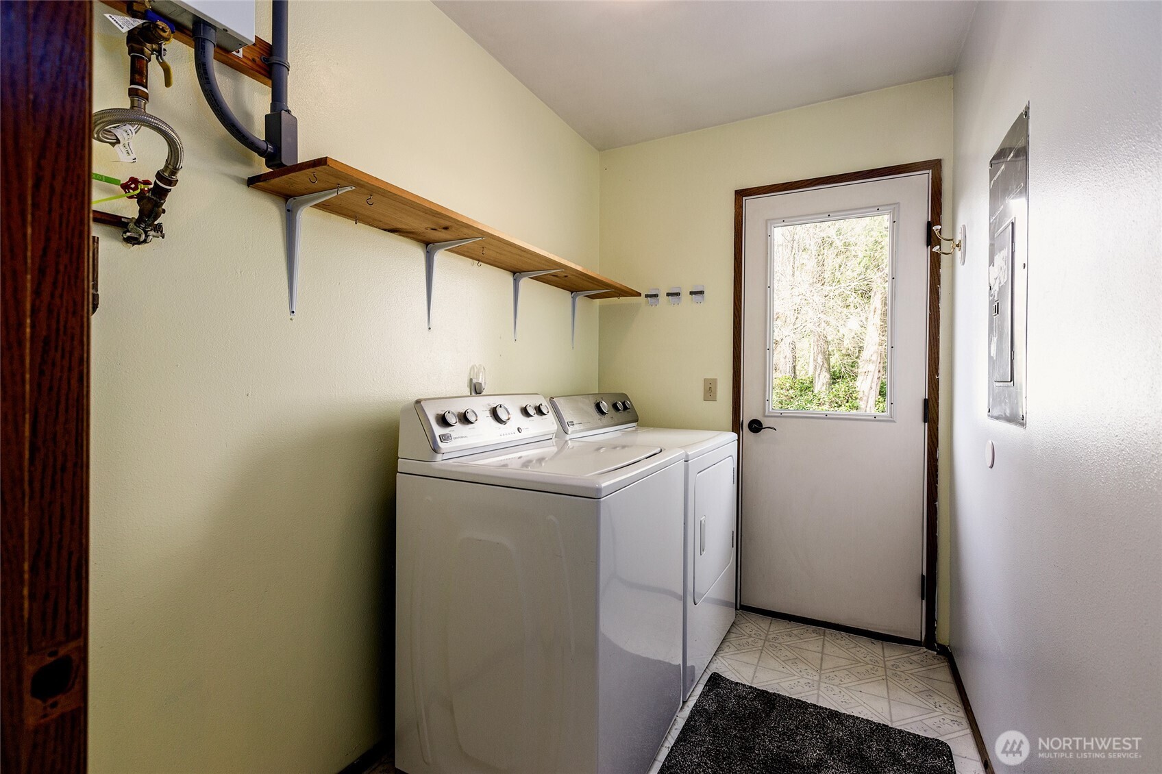 655 Hunt Street Friday Harbor, WA 98250 - Photo 11 of 26 a utility room with dryer and washer