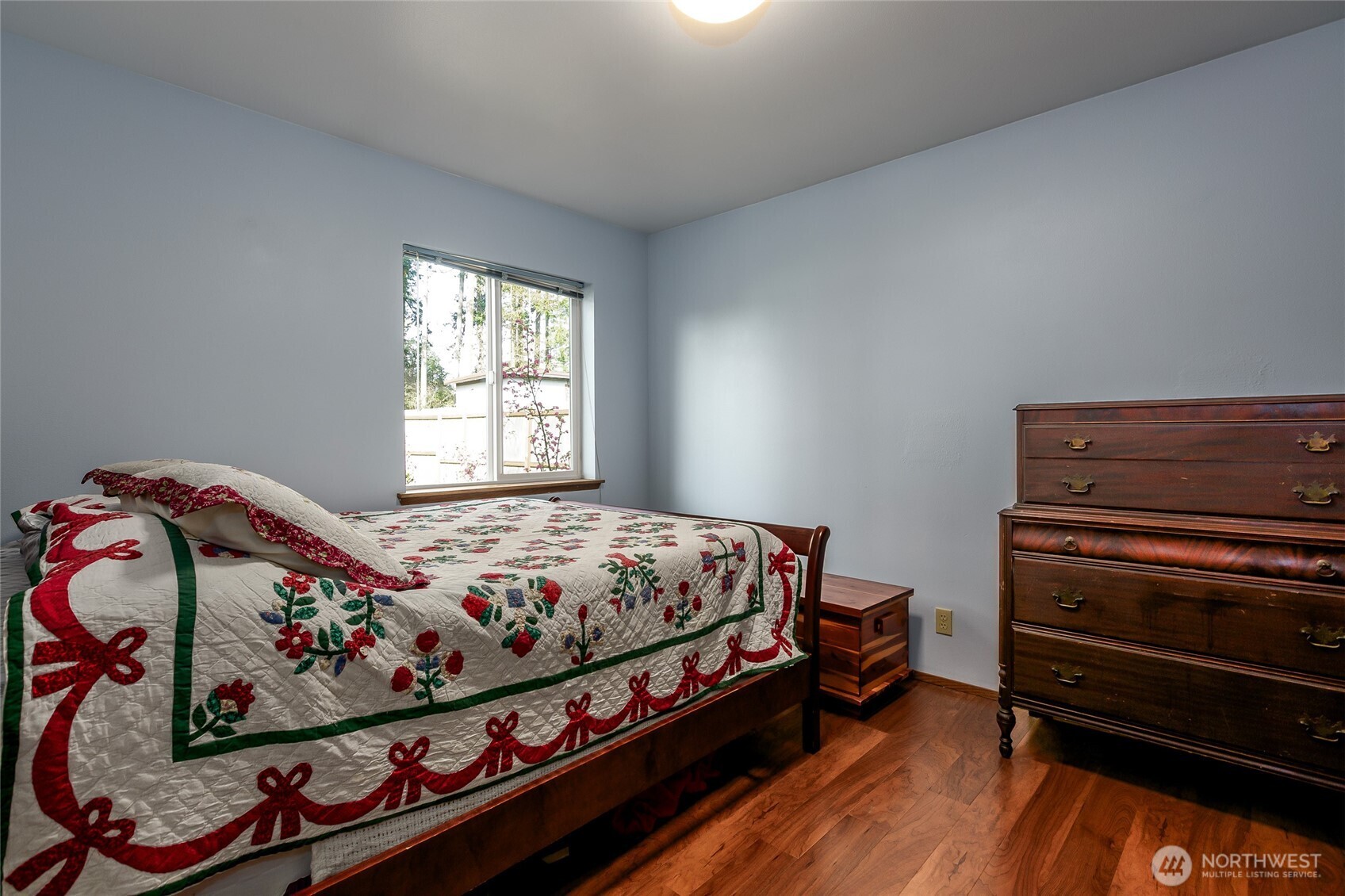 655 Hunt Street Friday Harbor, WA 98250 - Photo 12 of 26 a bed sitting in a bedroom next to a window