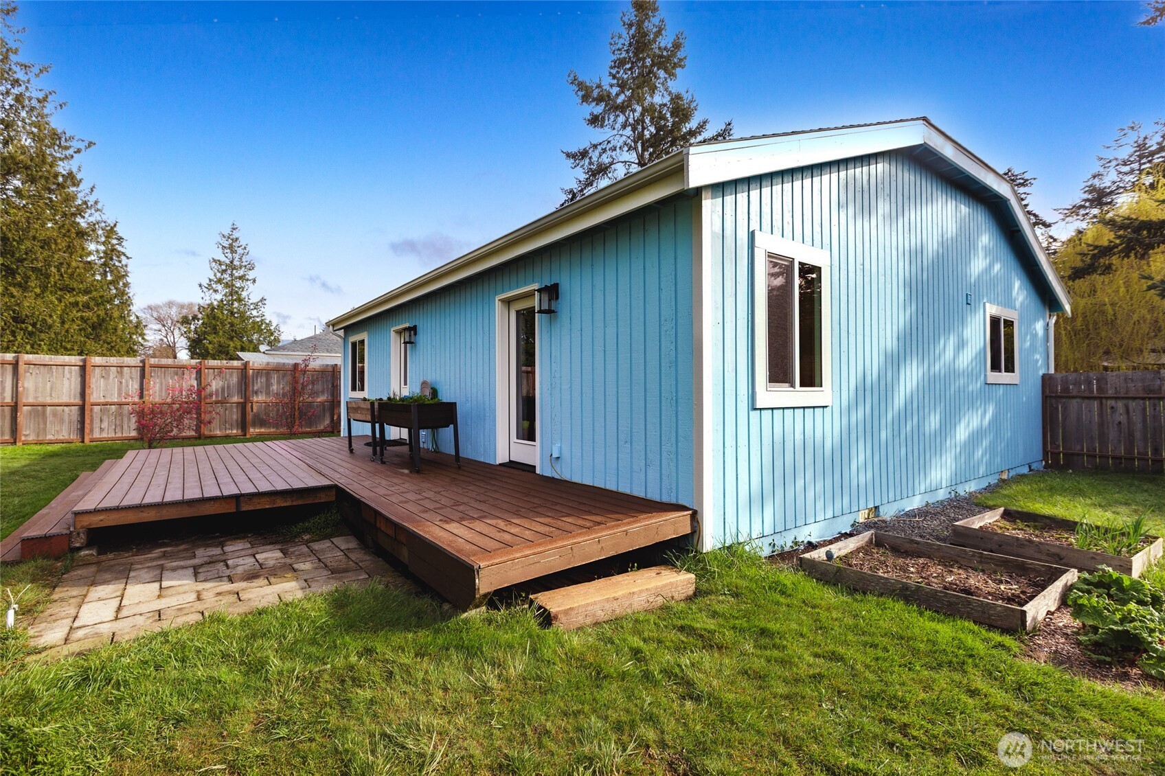 655 Hunt Street Friday Harbor, WA 98250 - Photo 15 of 26 a front view of house with yard and entertaining space