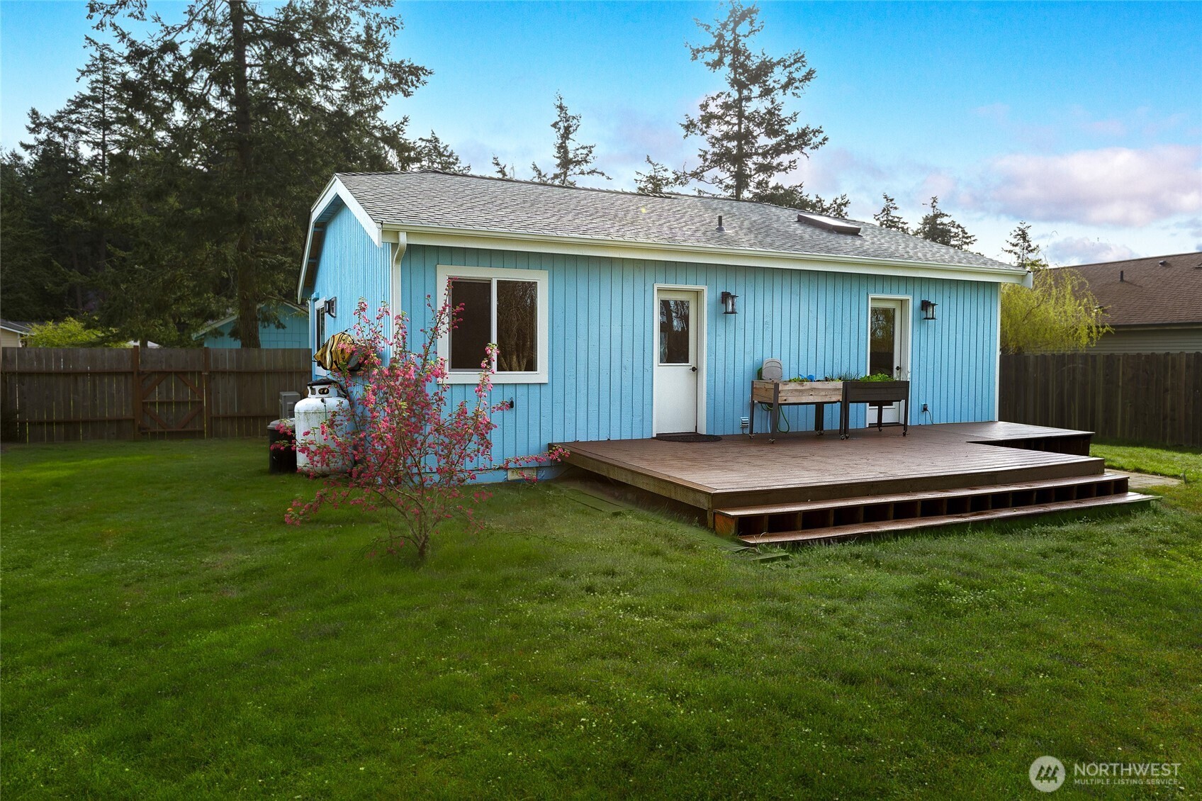 655 Hunt Street Friday Harbor, WA 98250 - Photo 16 of 26 a front view of a house with garden bath tub and couches