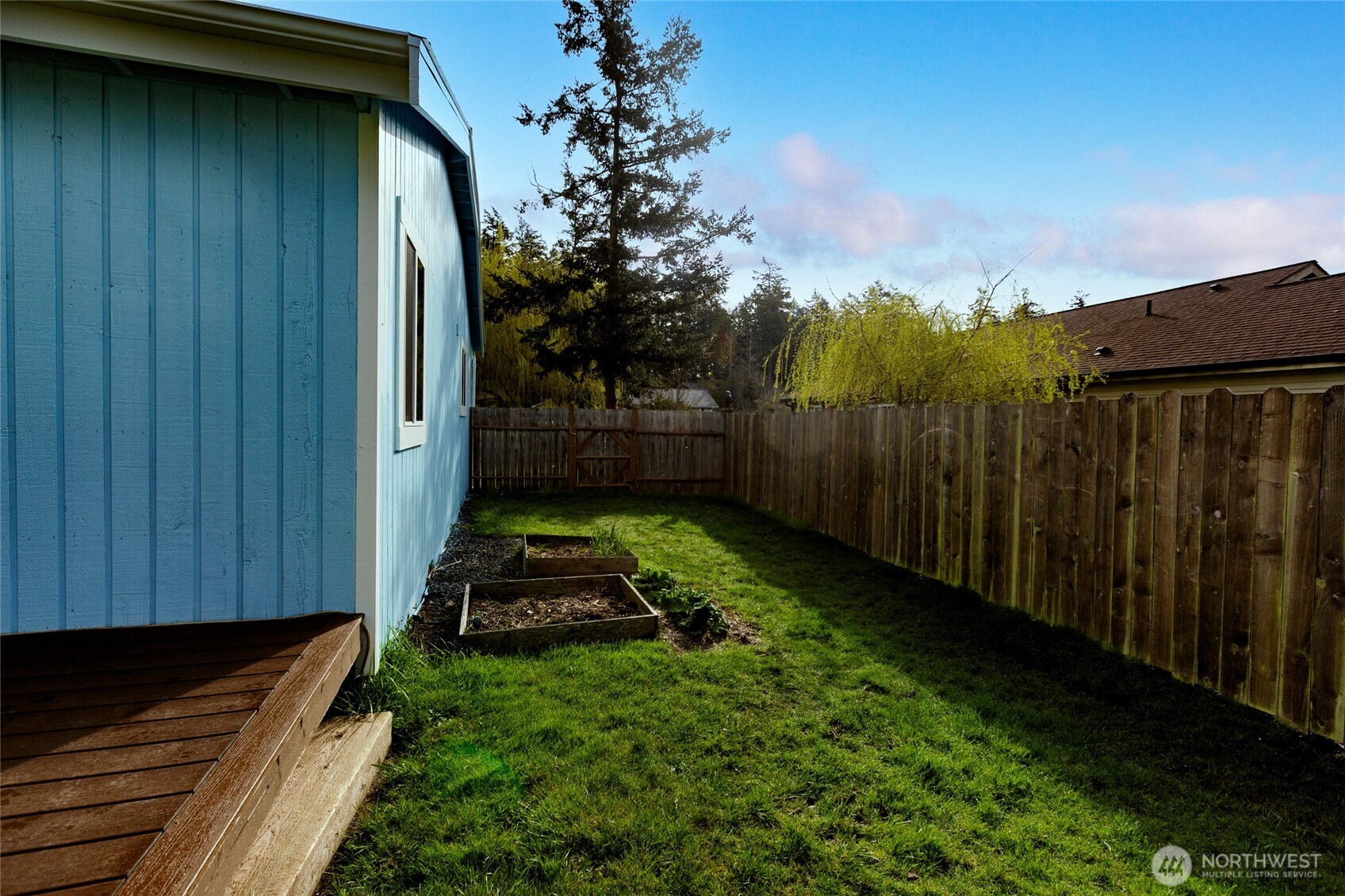 655 Hunt Street Friday Harbor, WA 98250 - Photo 21 of 26 a view of a backyard with pathway