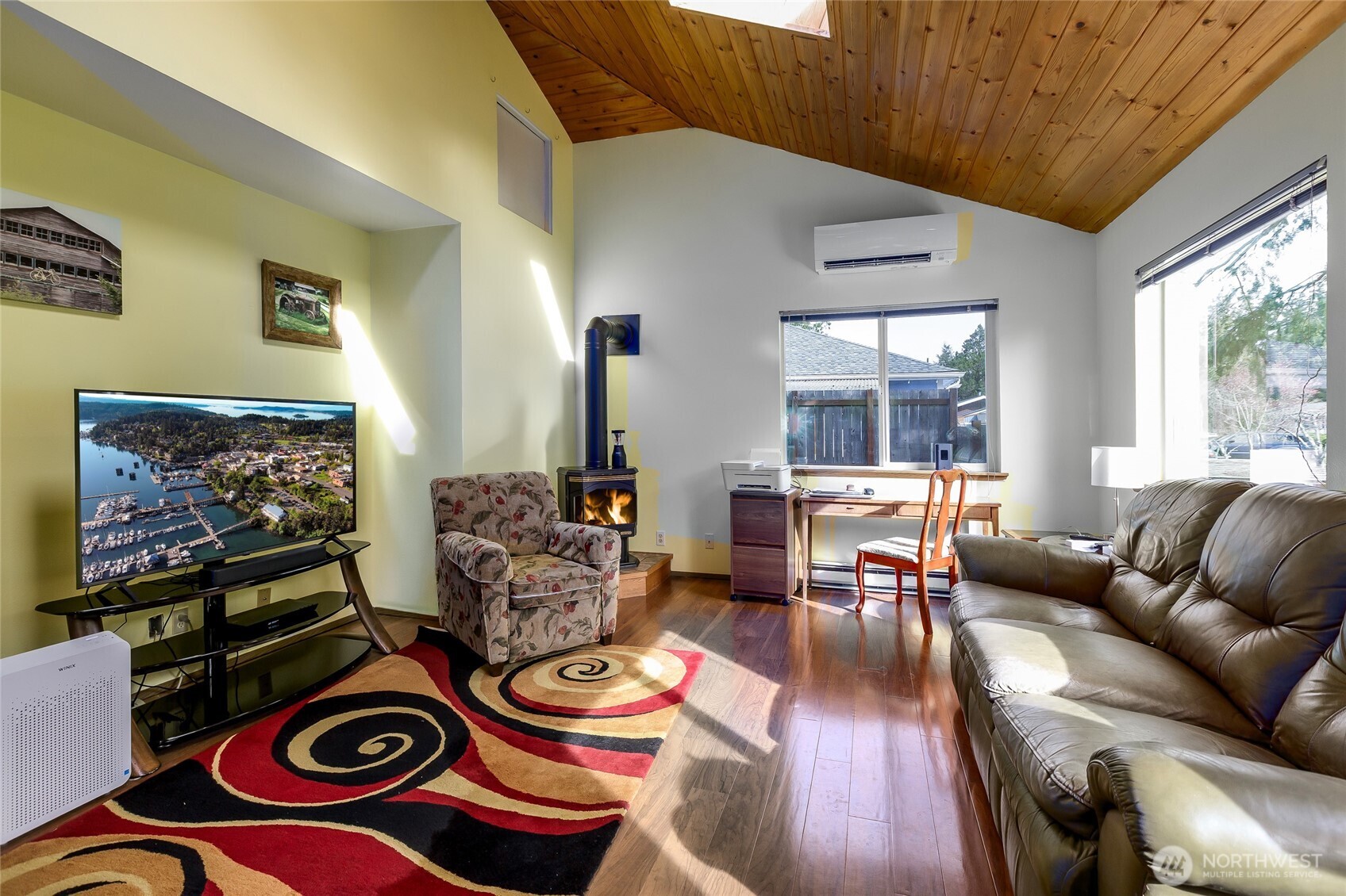 655 Hunt Street Friday Harbor, WA 98250 - Photo 5 of 26 a living room with furniture and a flat screen tv
