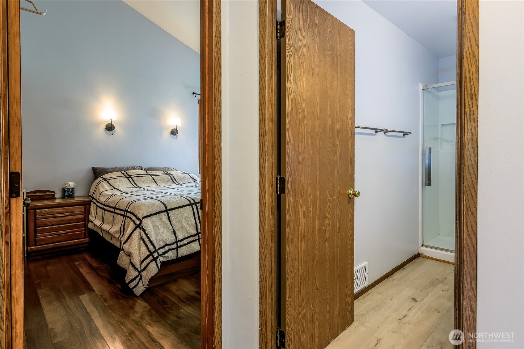 655 Hunt Street Friday Harbor, WA 98250 - Photo 7 of 26 a bedroom with a bed and a mirror