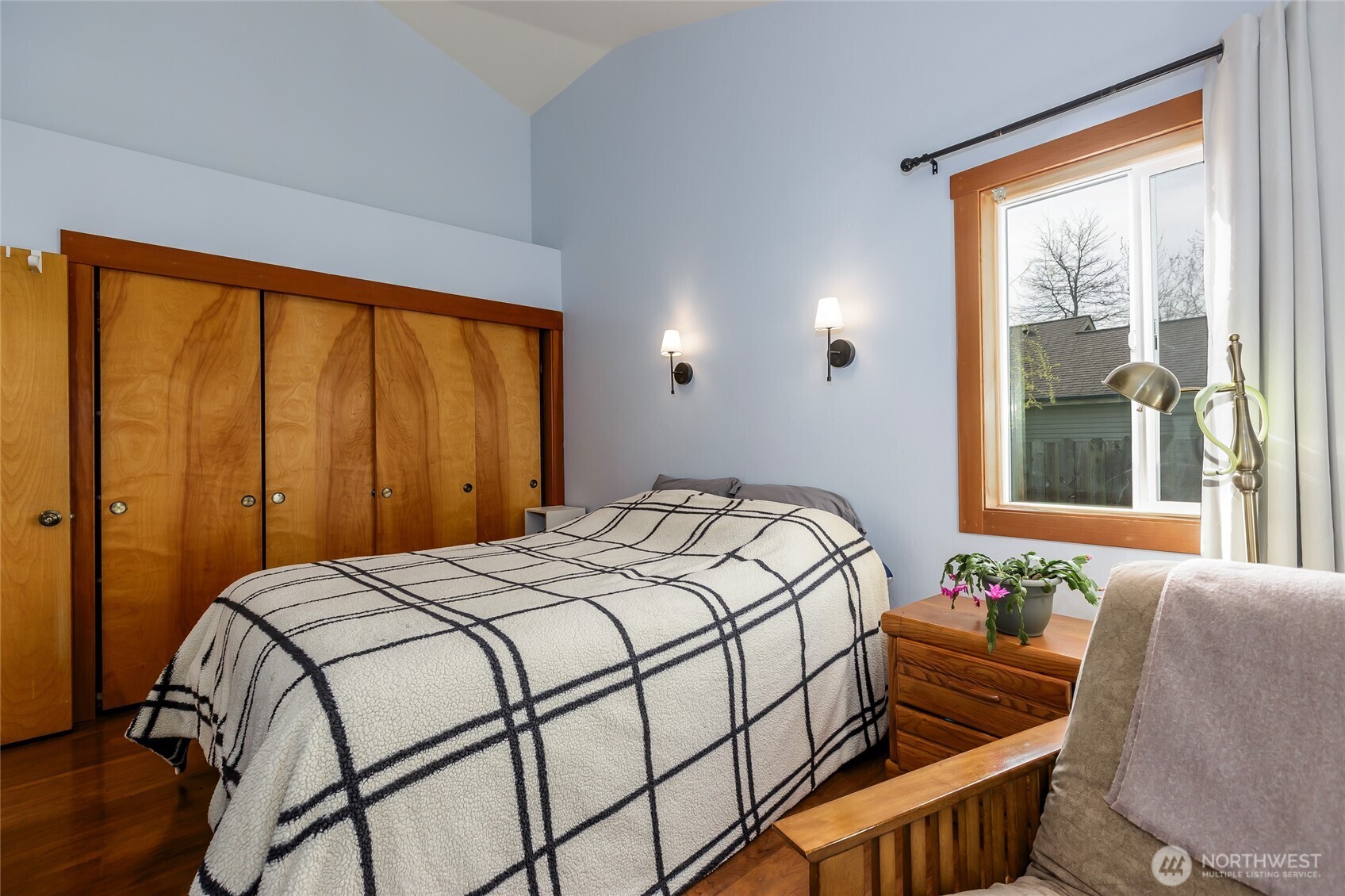 655 Hunt Street Friday Harbor, WA 98250 - Photo 10 of 26 a bedroom with a bed and windows