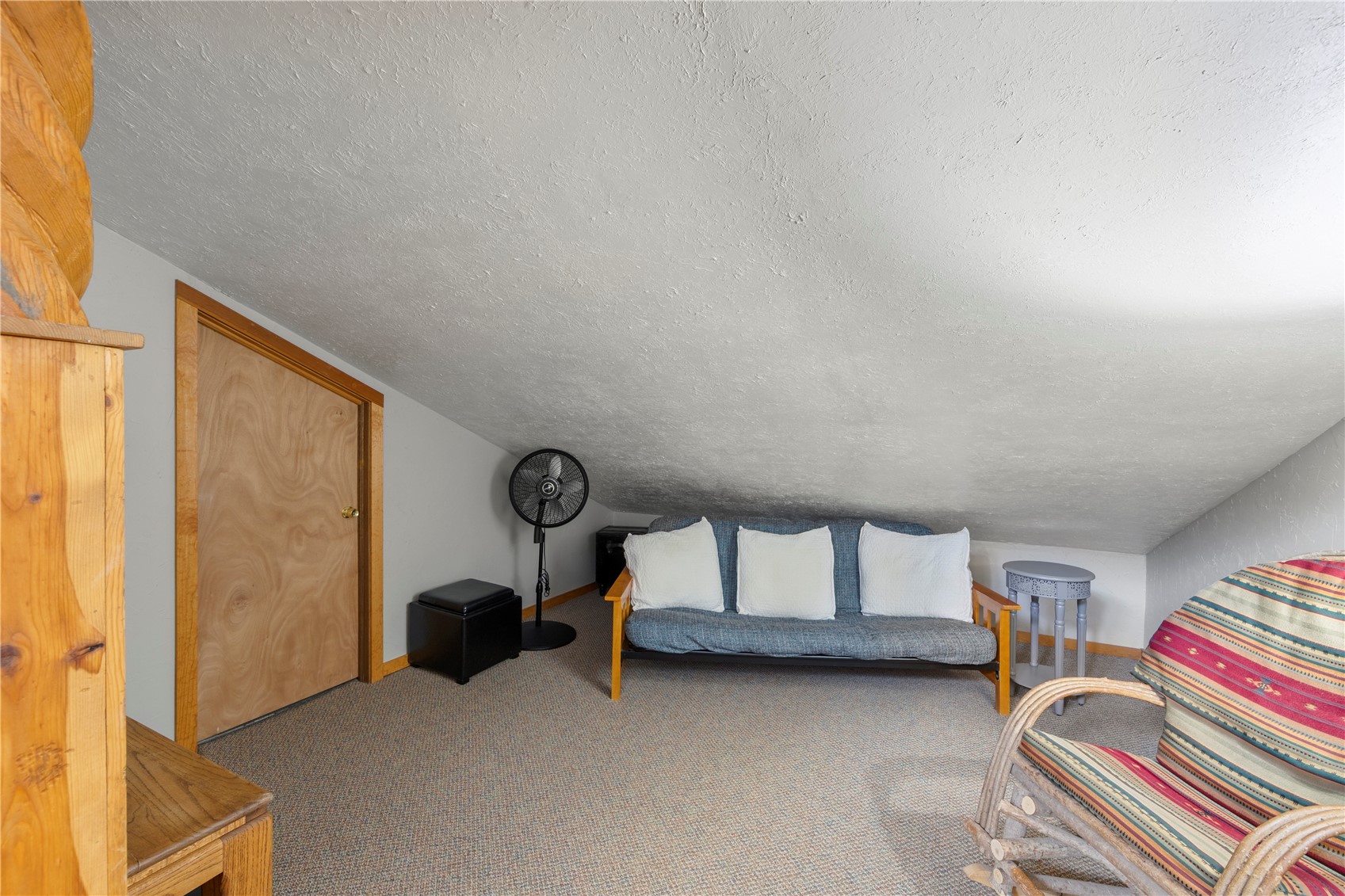 9490 Ryan Gulch Road, Unit 94202 Silverthorne, CO 80498 - Photo 28 of 50 a living room with furniture