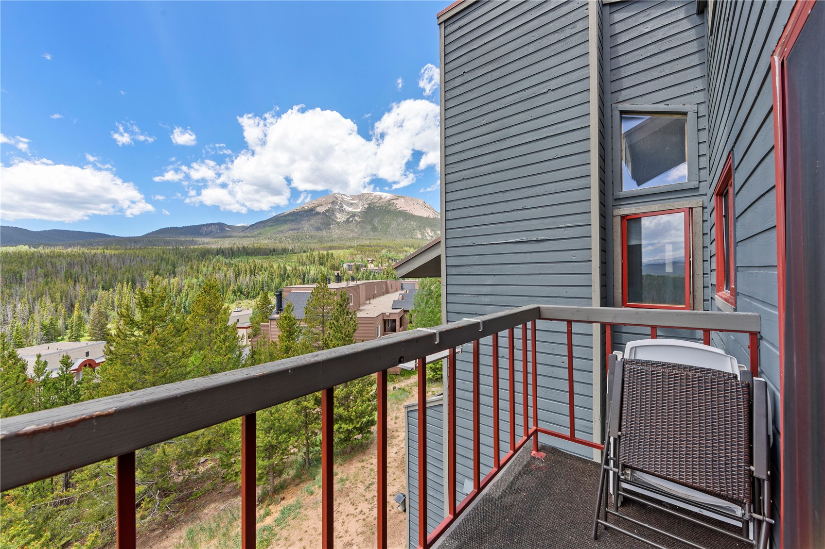 9490 Ryan Gulch Road, Unit 94202 Silverthorne, CO 80498 - Photo 3 of 50 a view of a balcony with chair