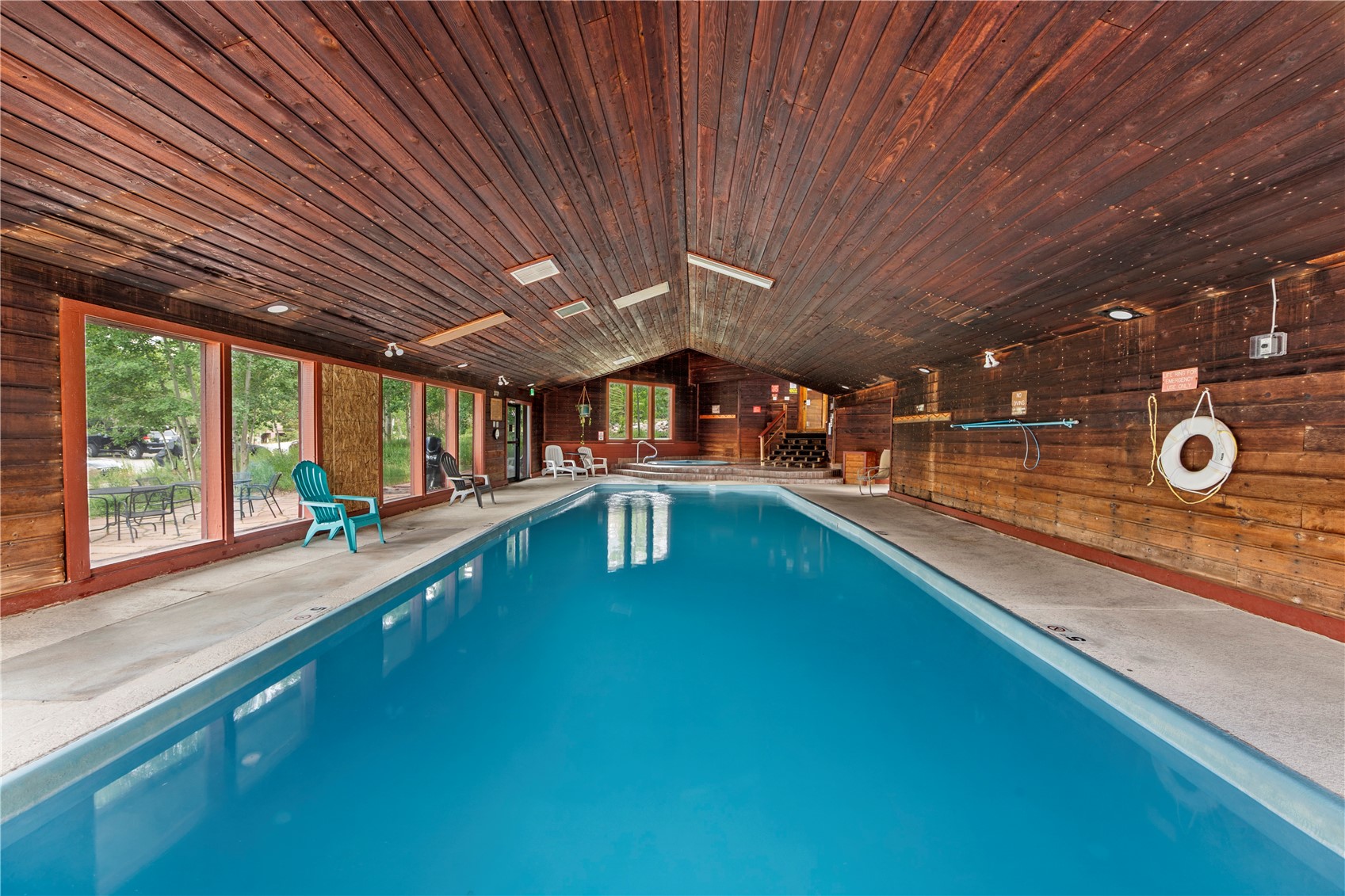 9490 Ryan Gulch Road, Unit 94202 Silverthorne, CO 80498 - Photo 42 of 50 a view of a swimming pool with a outdoor seating