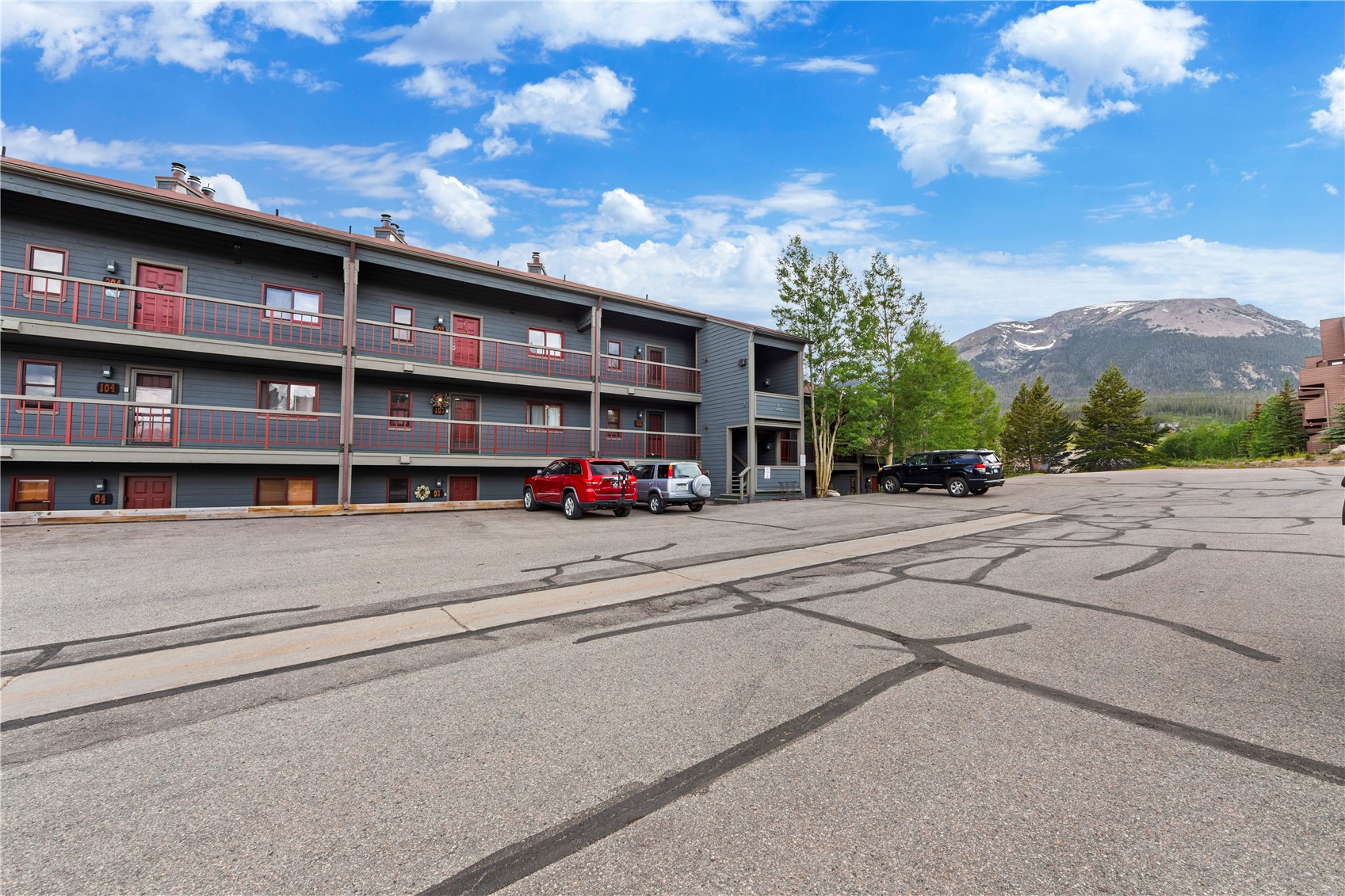 9490 Ryan Gulch Road, Unit 94202 Silverthorne, CO 80498 - Photo 6 of 50 a view of a street with a building in the background