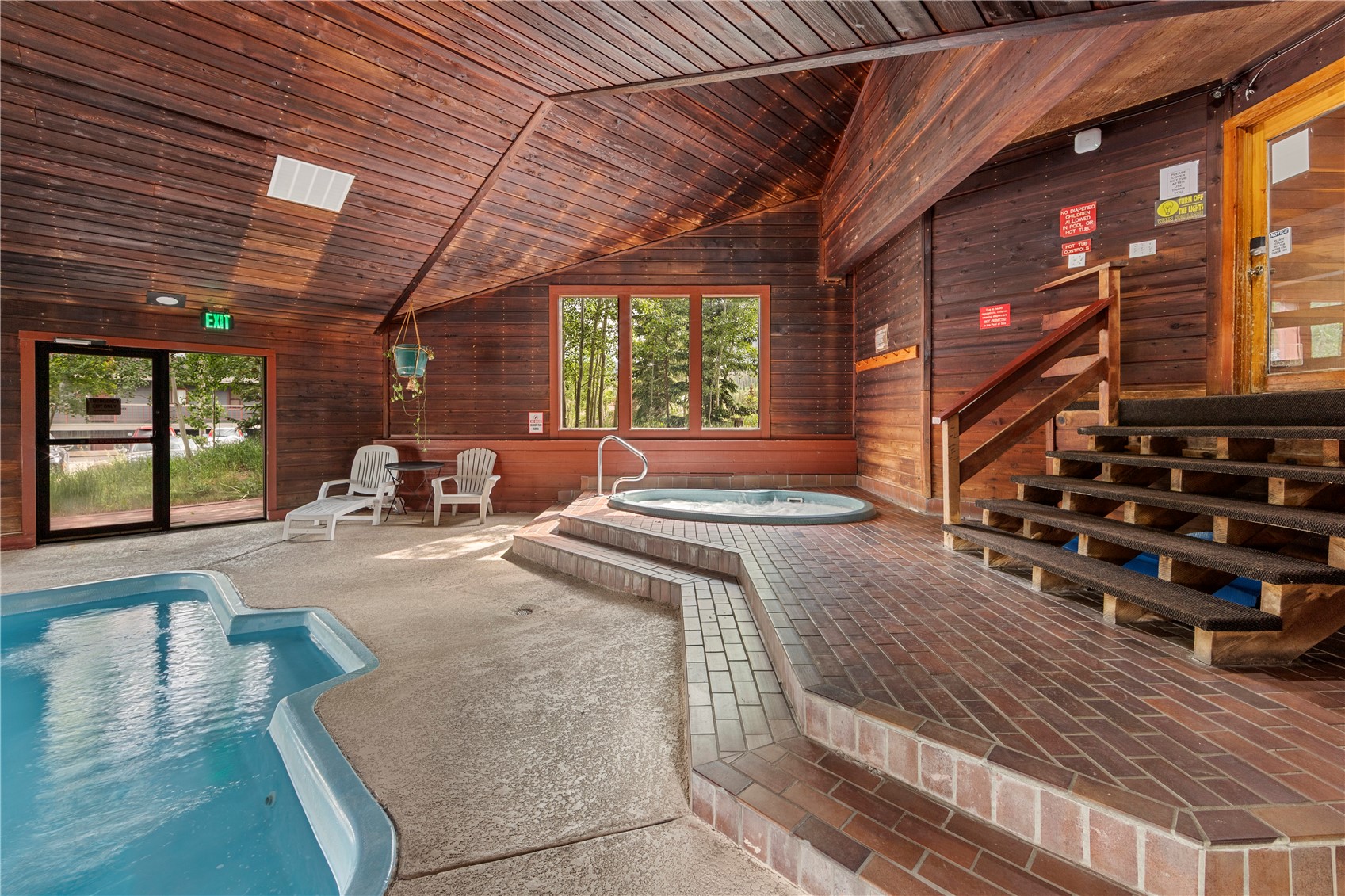 9490 Ryan Gulch Road, Unit 94202 Silverthorne, CO 80498 - Photo 7 of 50 a view of a backyard with sitting area