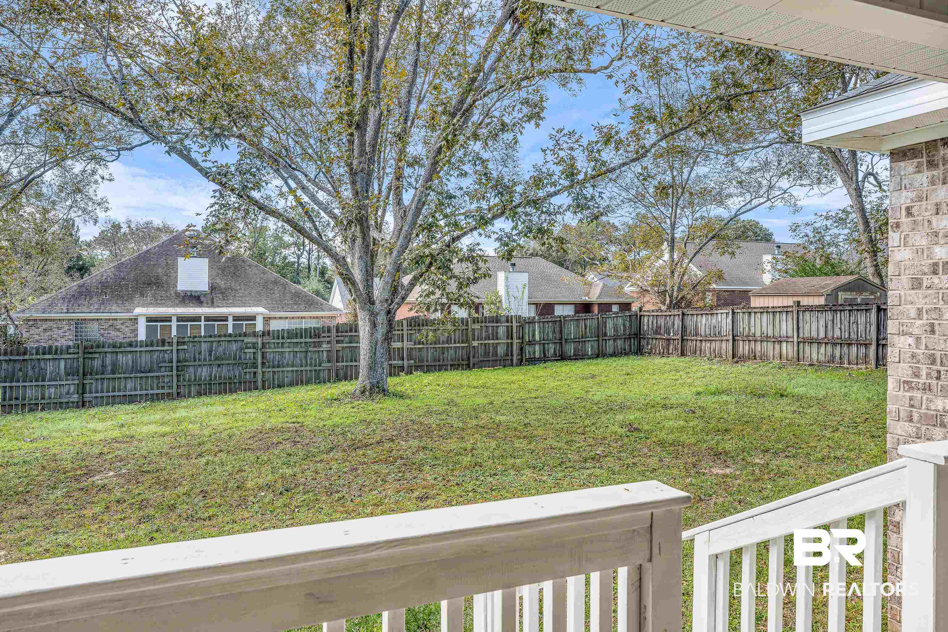 9206 Greenleaf Drive Daphne, AL 36527 - Photo 26 of 32 Fenced backyard with a balcony