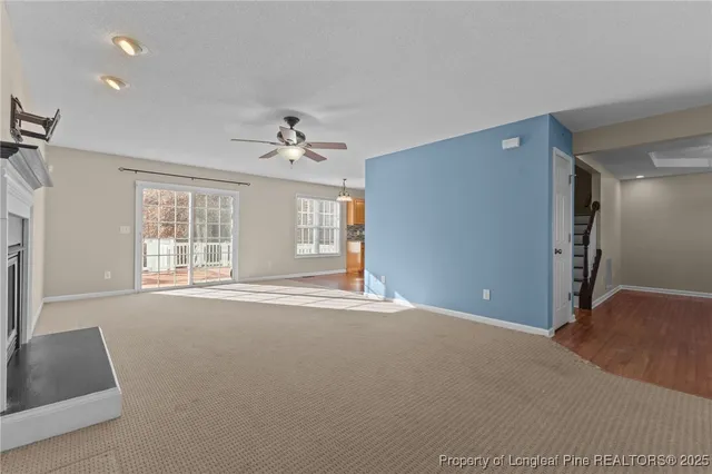 a living room with a fireplace