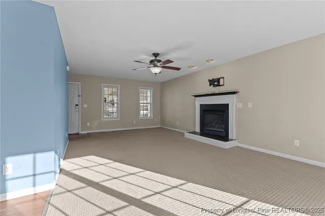 a view of a kitchen from the hallway