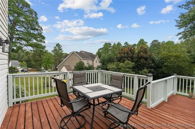 a view of a chairs on the deck