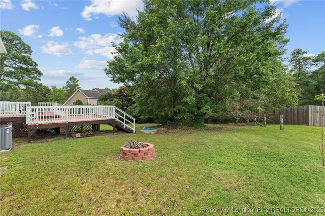 a view of a garden with a tree