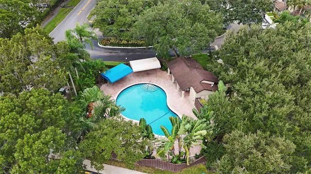 an aerial view of a house with a garden