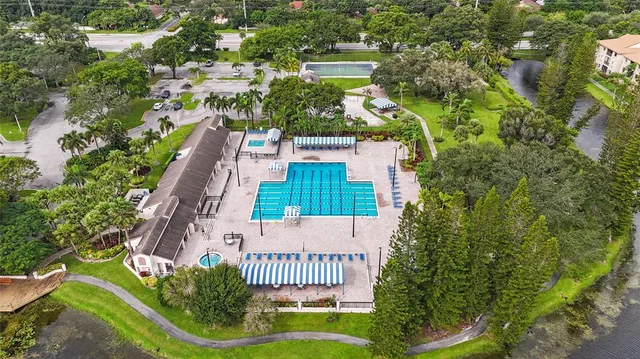 an aerial view of a house having yard