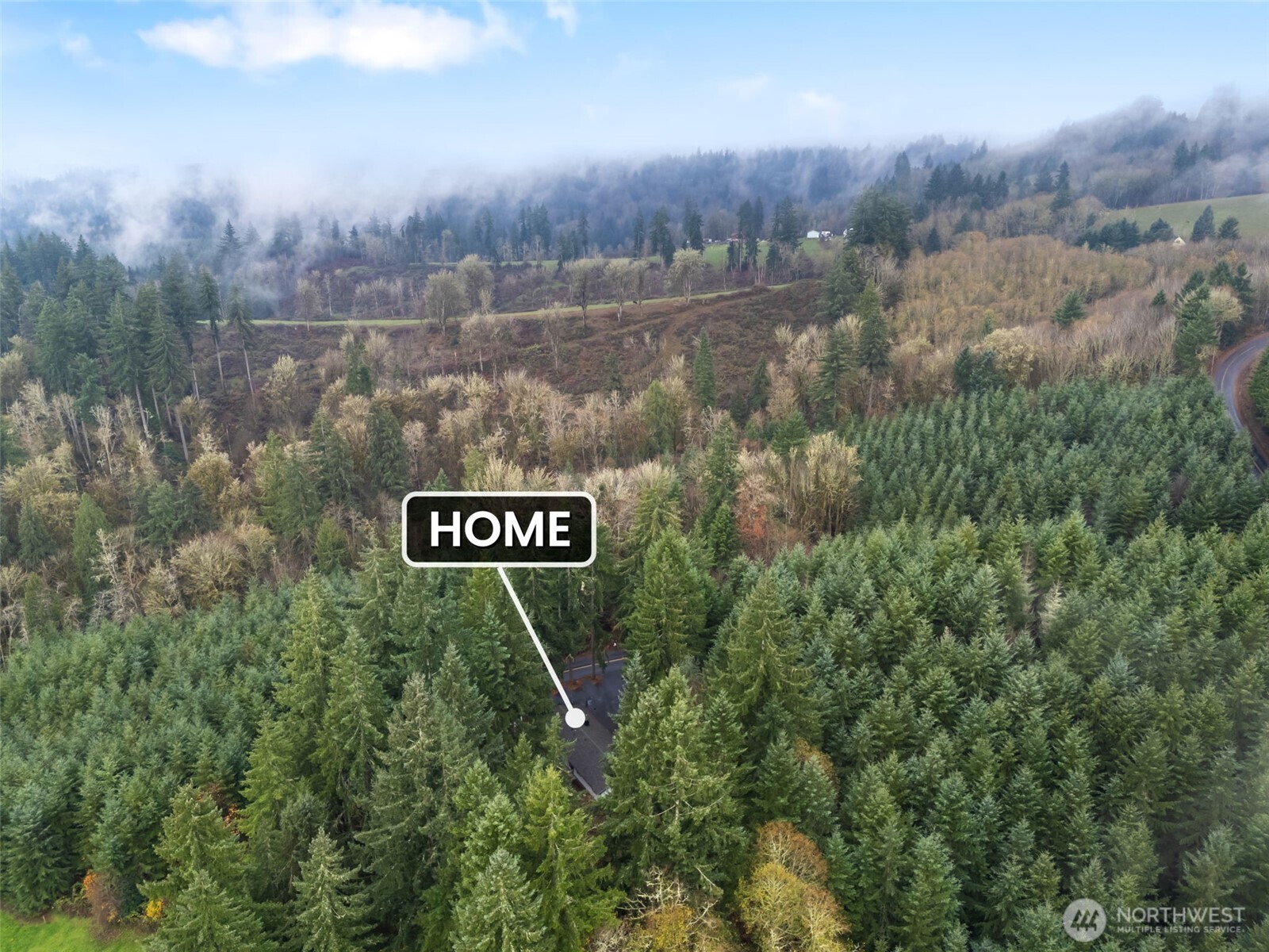 400 Ogden Road Castle Rock, WA 98611 - Photo 18 of 30 a view of a sign that is on a pole