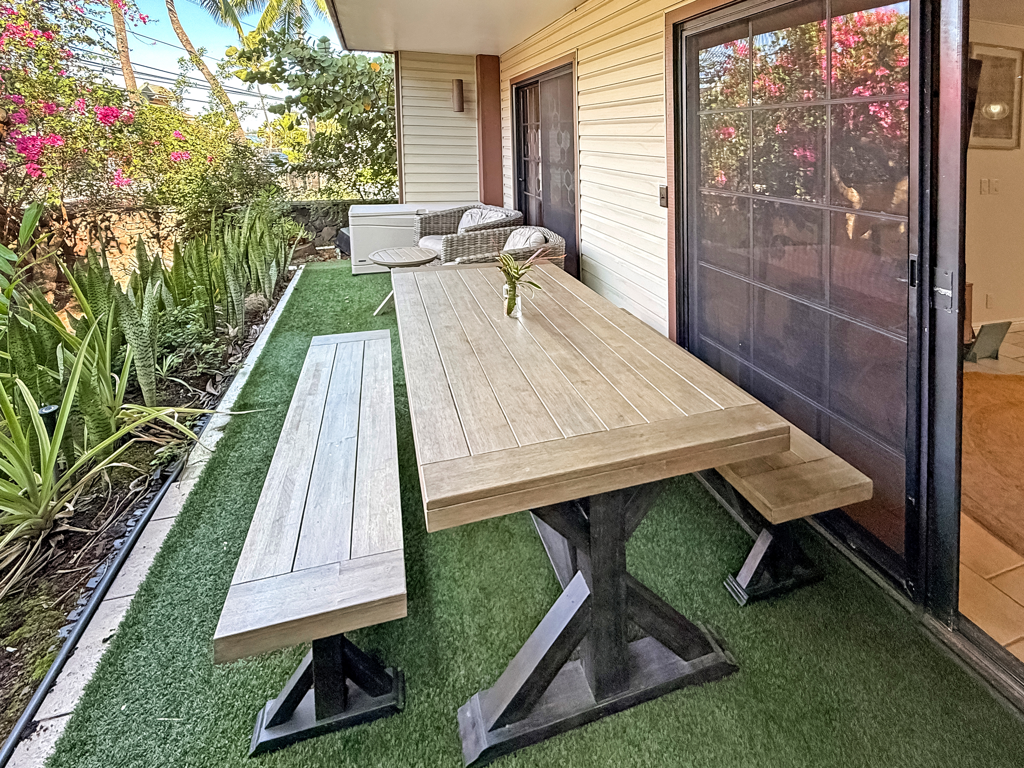 75-123 Lunapule Road, Unit 104 Kailua-Kona, HI 96740 - Photo 13 of 30 a view of a backyard with sitting area