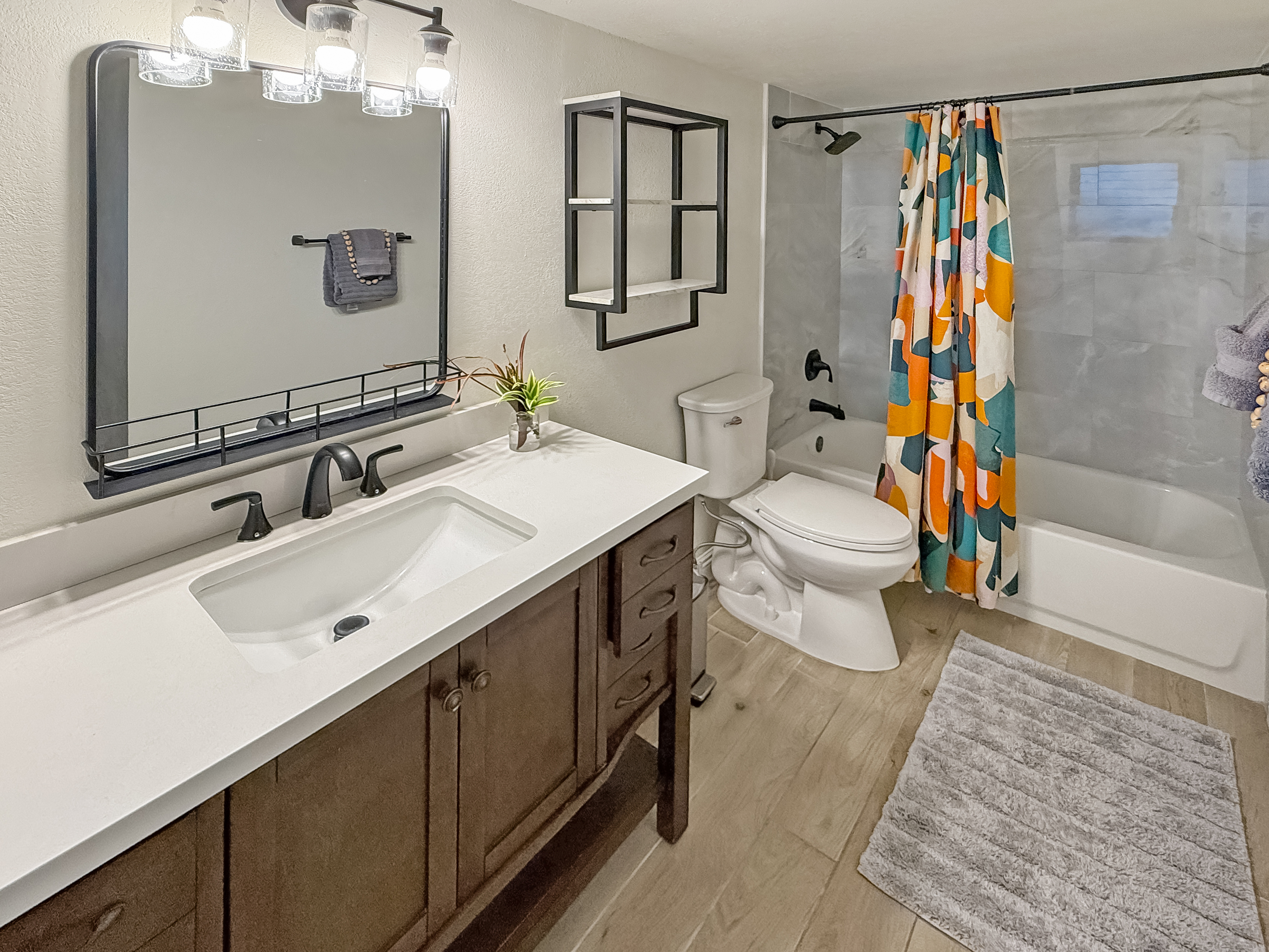 75-123 Lunapule Road, Unit 104 Kailua-Kona, HI 96740 - Photo 15 of 30 a bathroom with a sink a toilet and shower