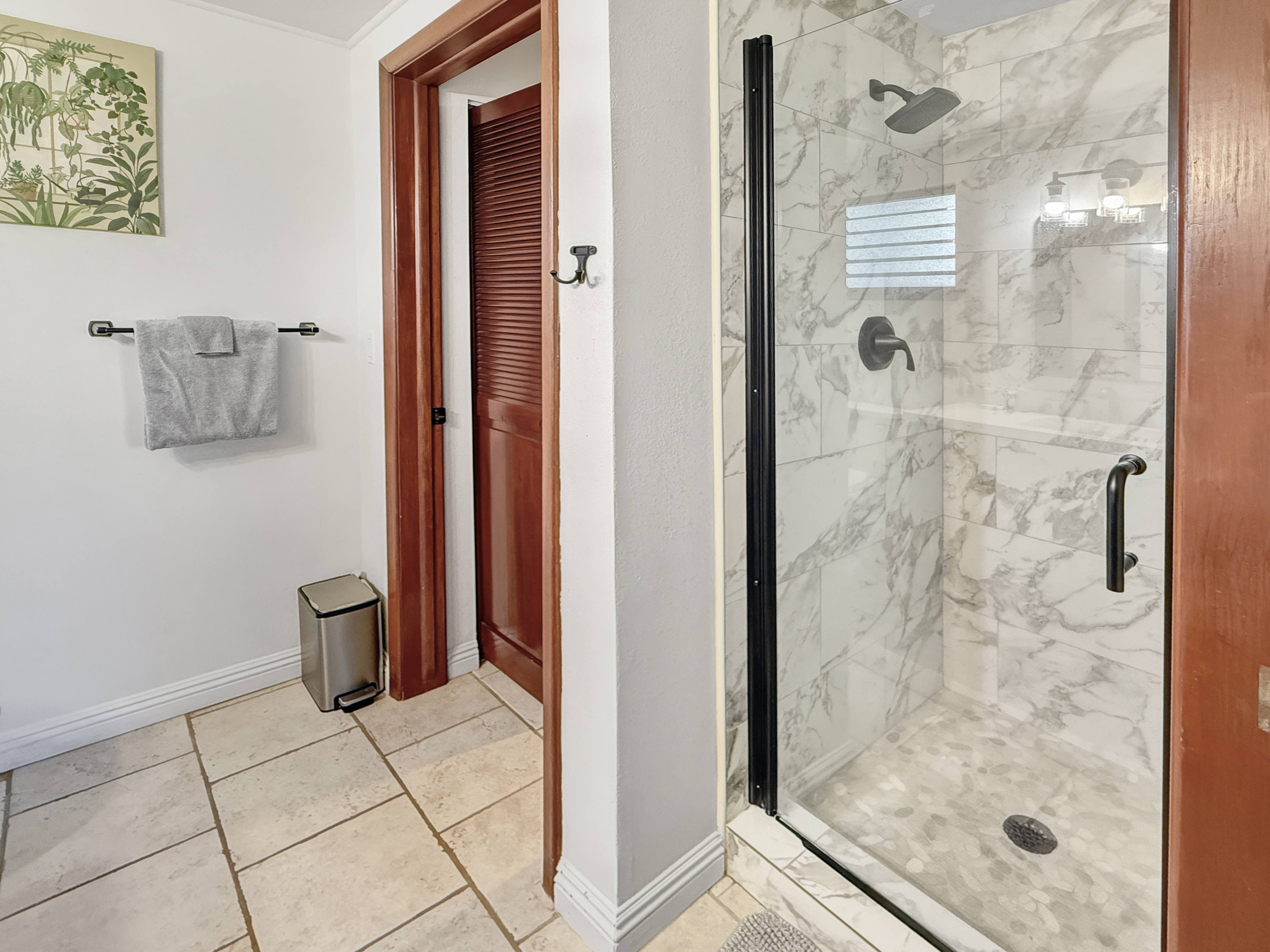 75-123 Lunapule Road, Unit 104 Kailua-Kona, HI 96740 - Photo 25 of 30 a bathroom with a shower and toilet