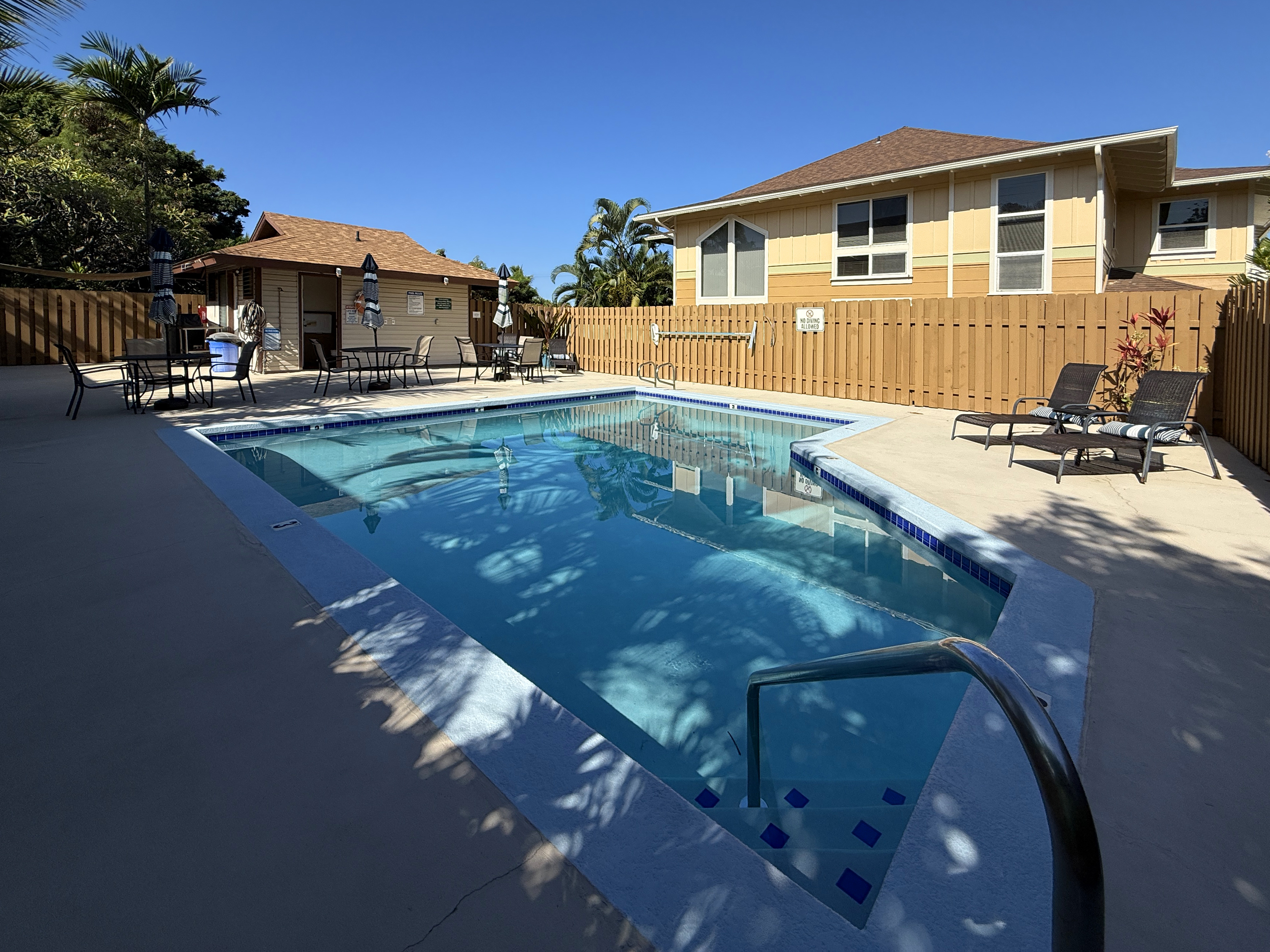 75-123 Lunapule Road, Unit 104 Kailua-Kona, HI 96740 - Photo 29 of 30 a front view of a house with swimming pool
